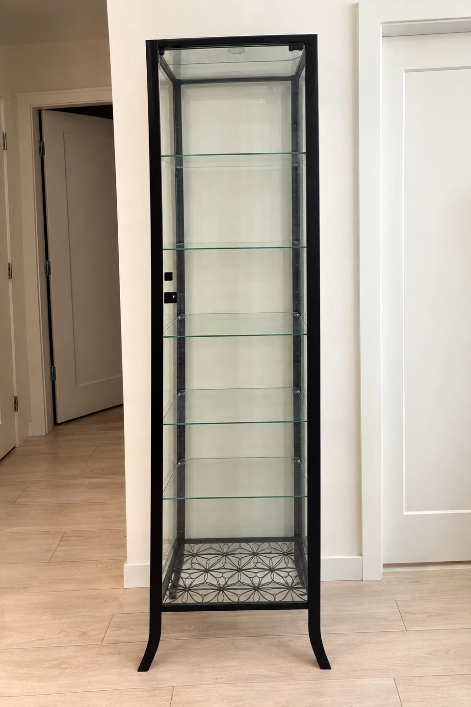 Glass door cabinet in black