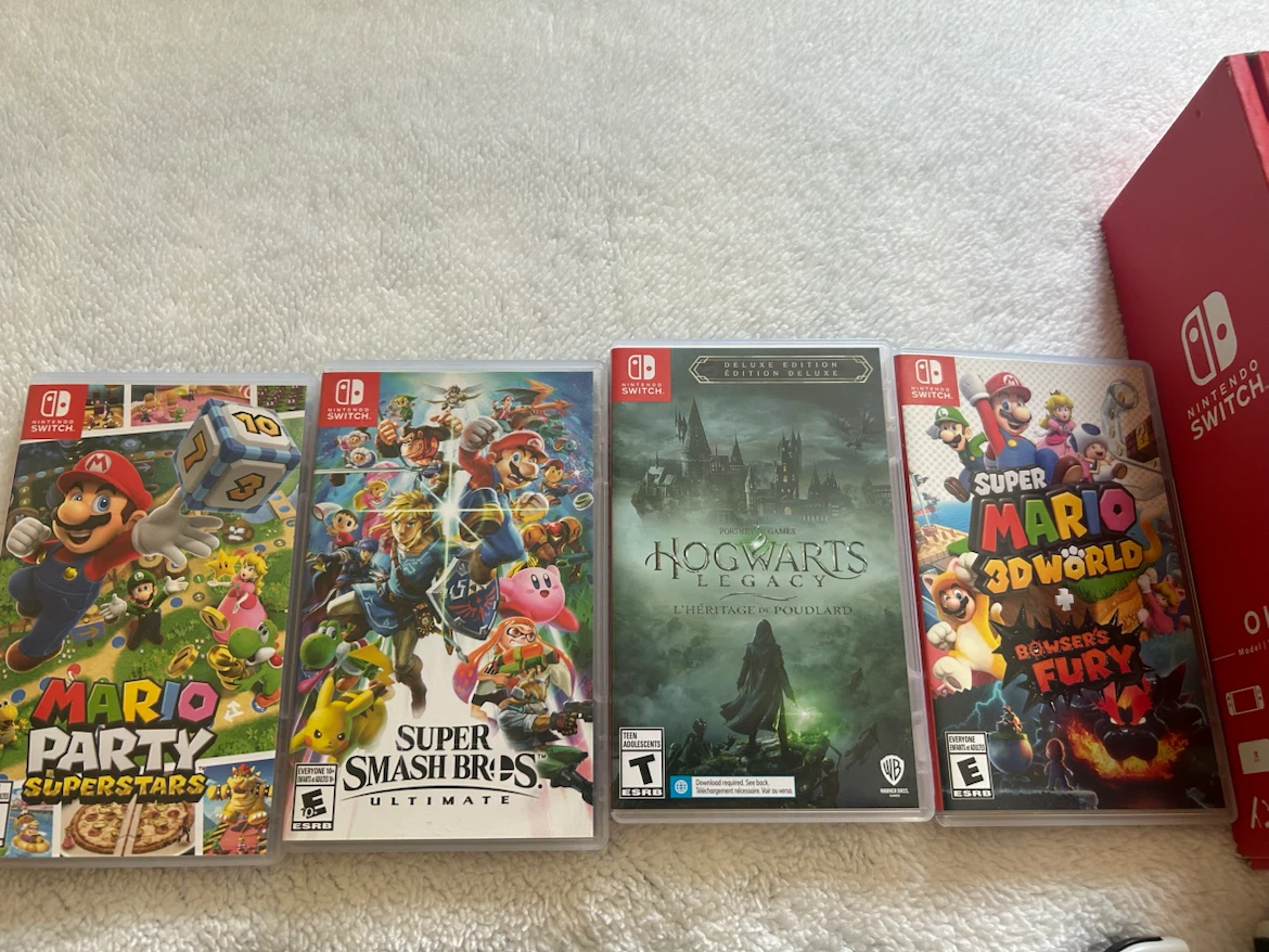 $800 Nintendo Switch OLED Bundle - photo 4
