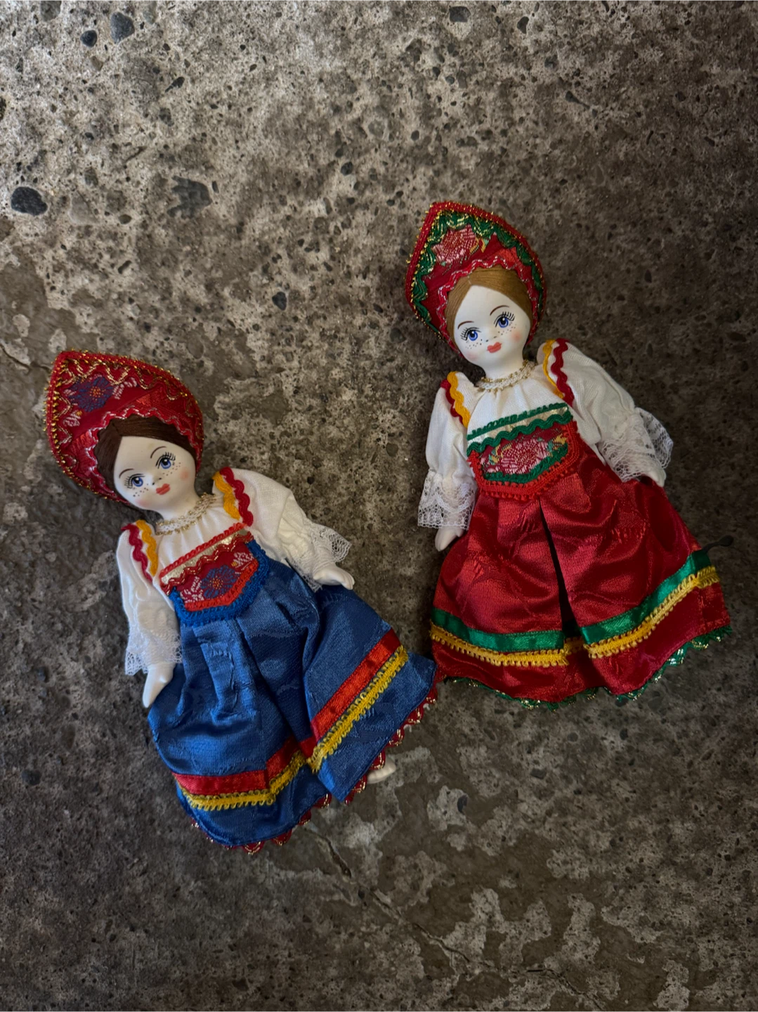 2 authentic porcelain dolls.