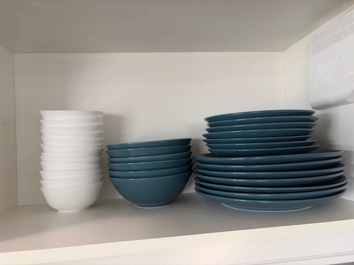 Assorted IKEA ceramic bowls and plates set