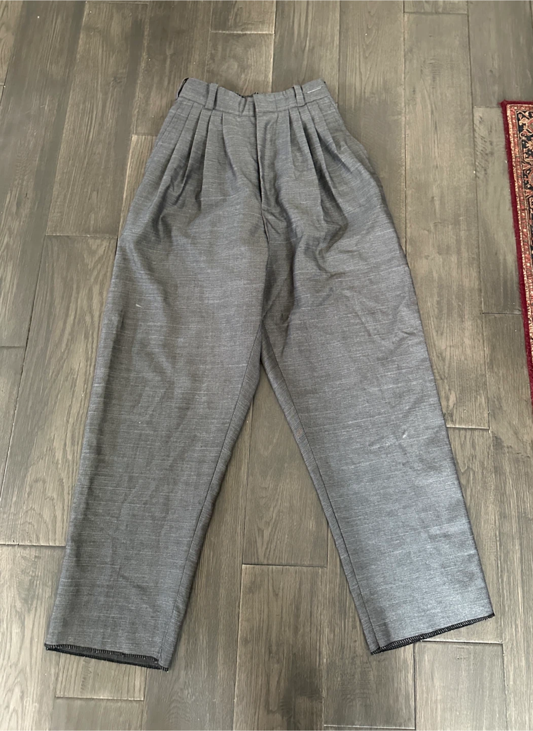 Grey pleated wide leg trousers