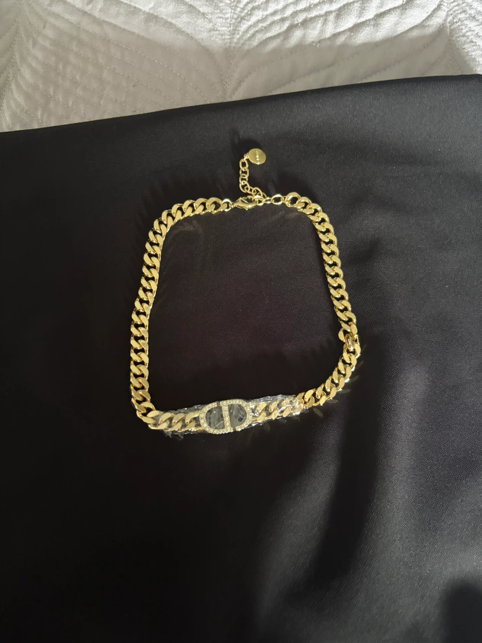 Gold-tone CD logo necklace with crystals