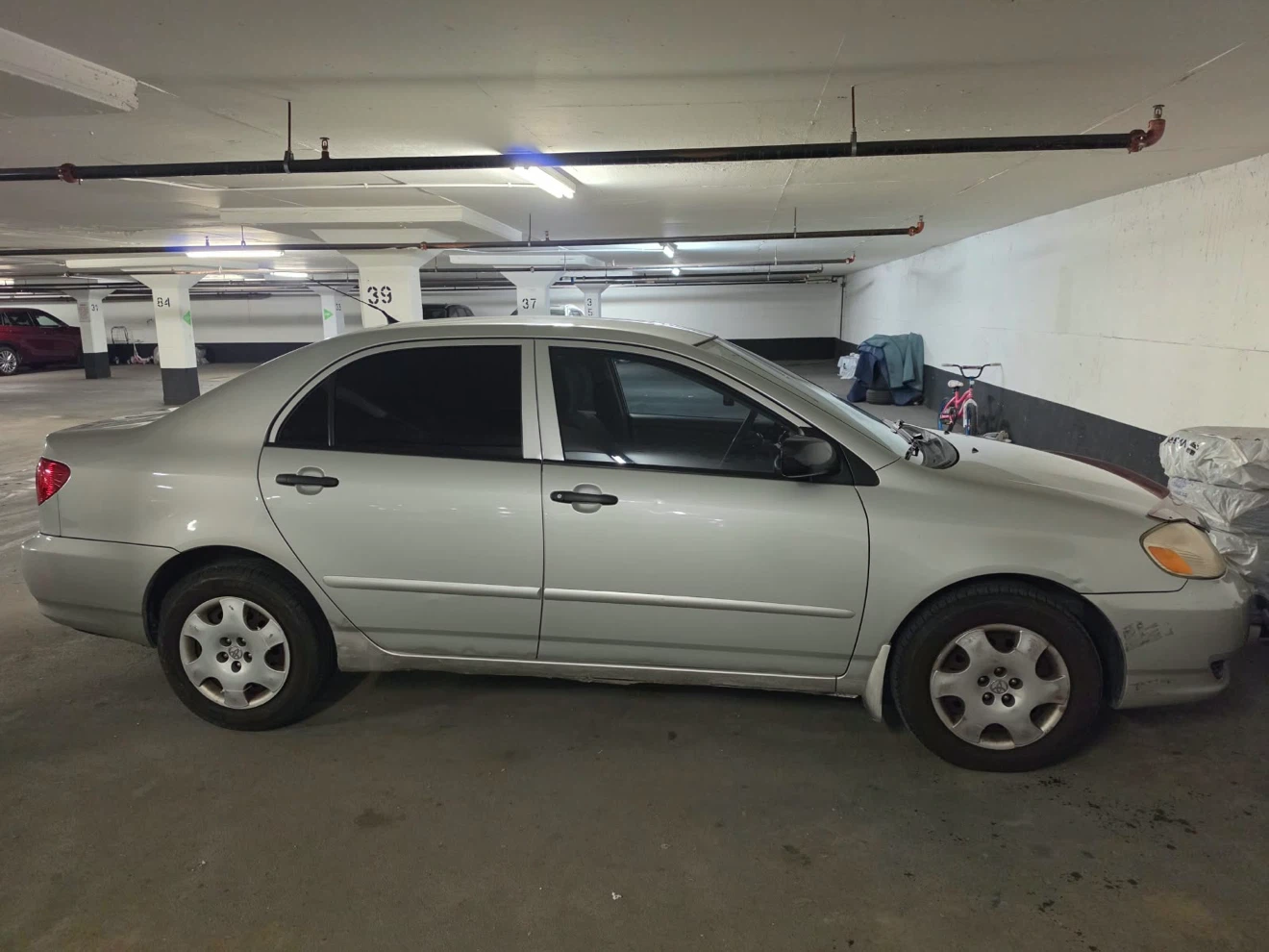 Silver Toyota Corolla LE - photo 4