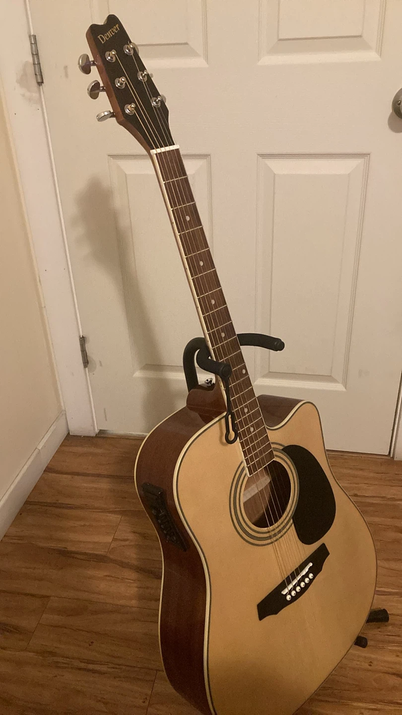 Denver acoustic electric guitar with Levy’s gig bag