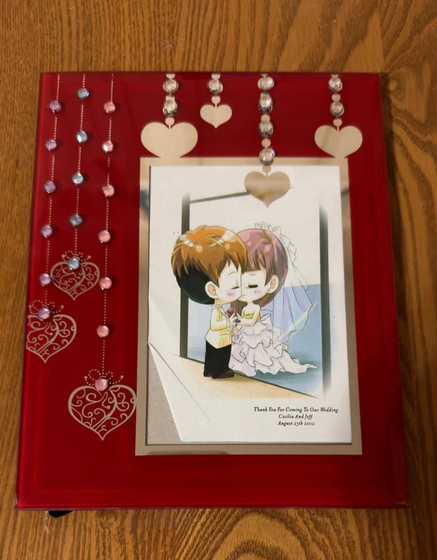 Red wedding photo album with heart designs