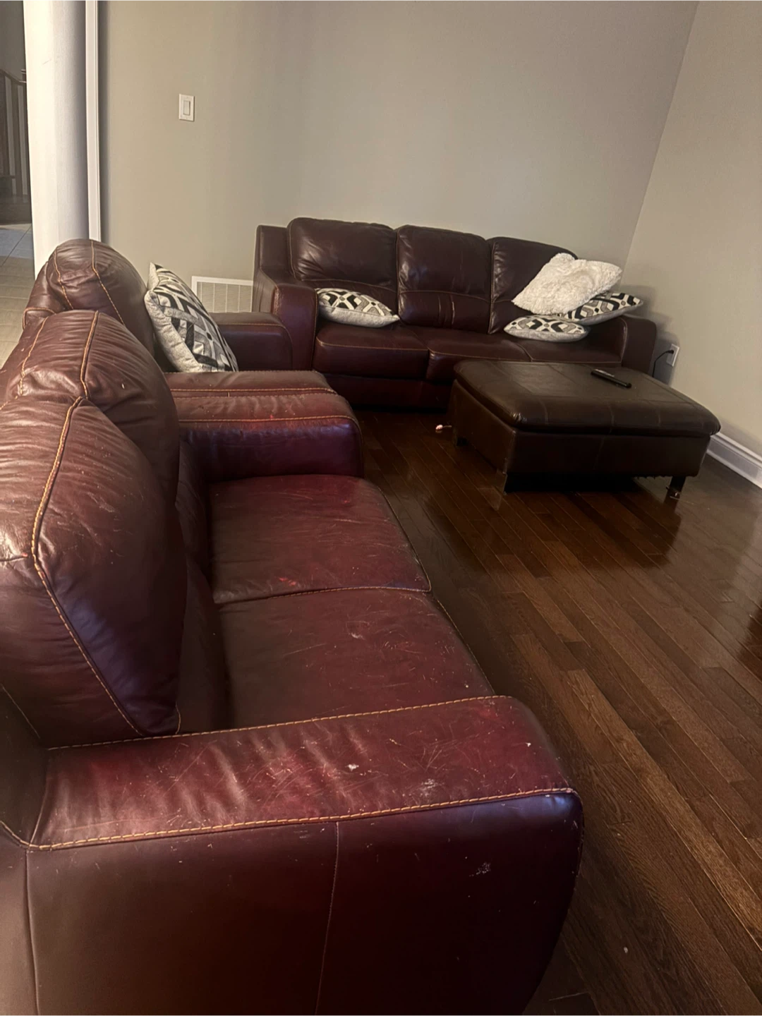 leather sofa and armchair set with ottoman