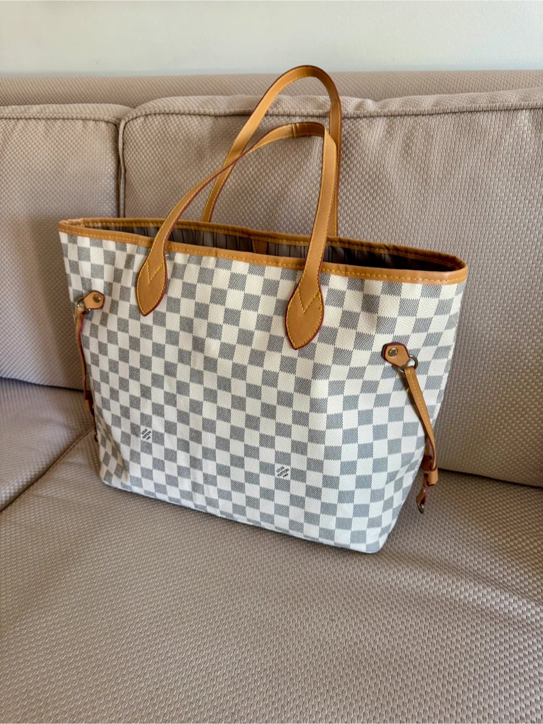 monogram neverfull bag with a tote.
