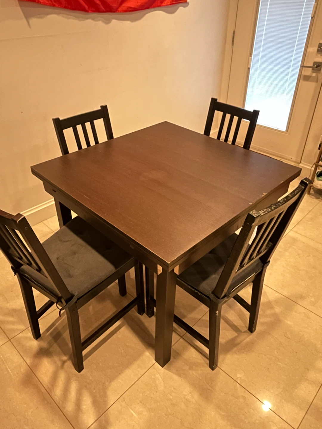 IKEA extendable dining table with 4 chairs