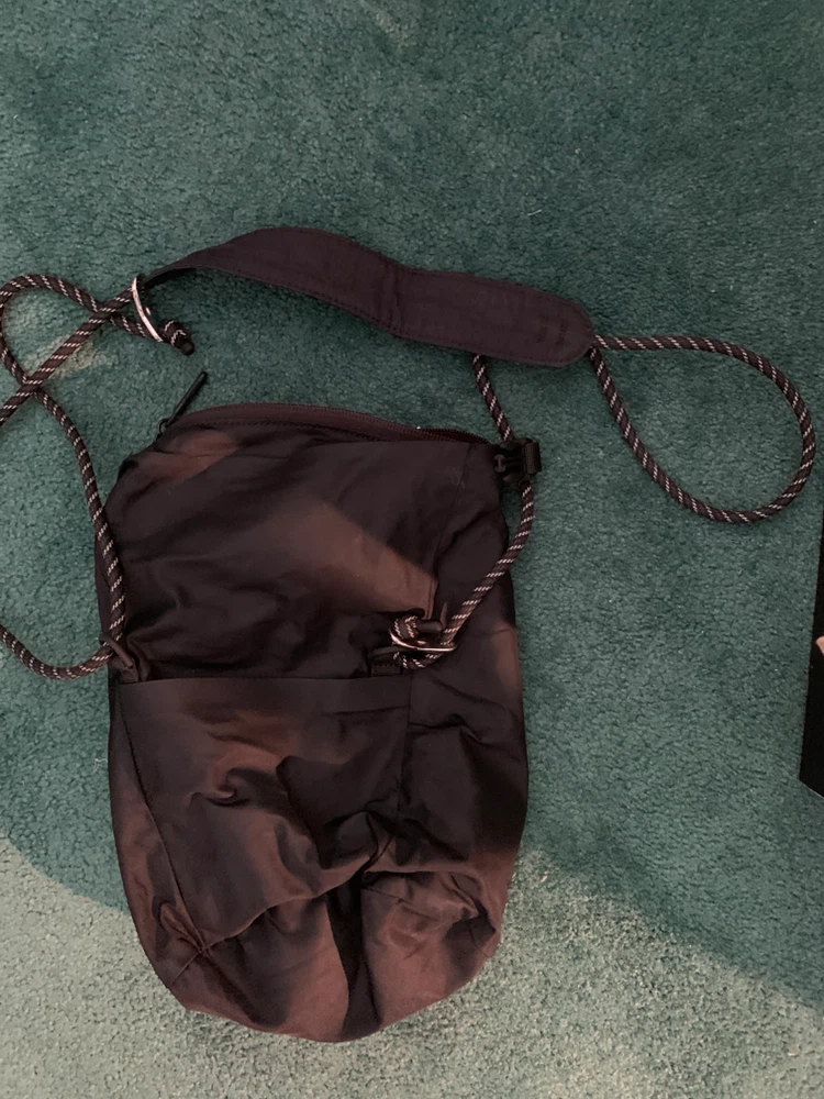 Black crossbody bag with rope strap