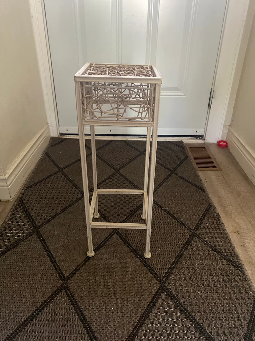White decorative plant stand