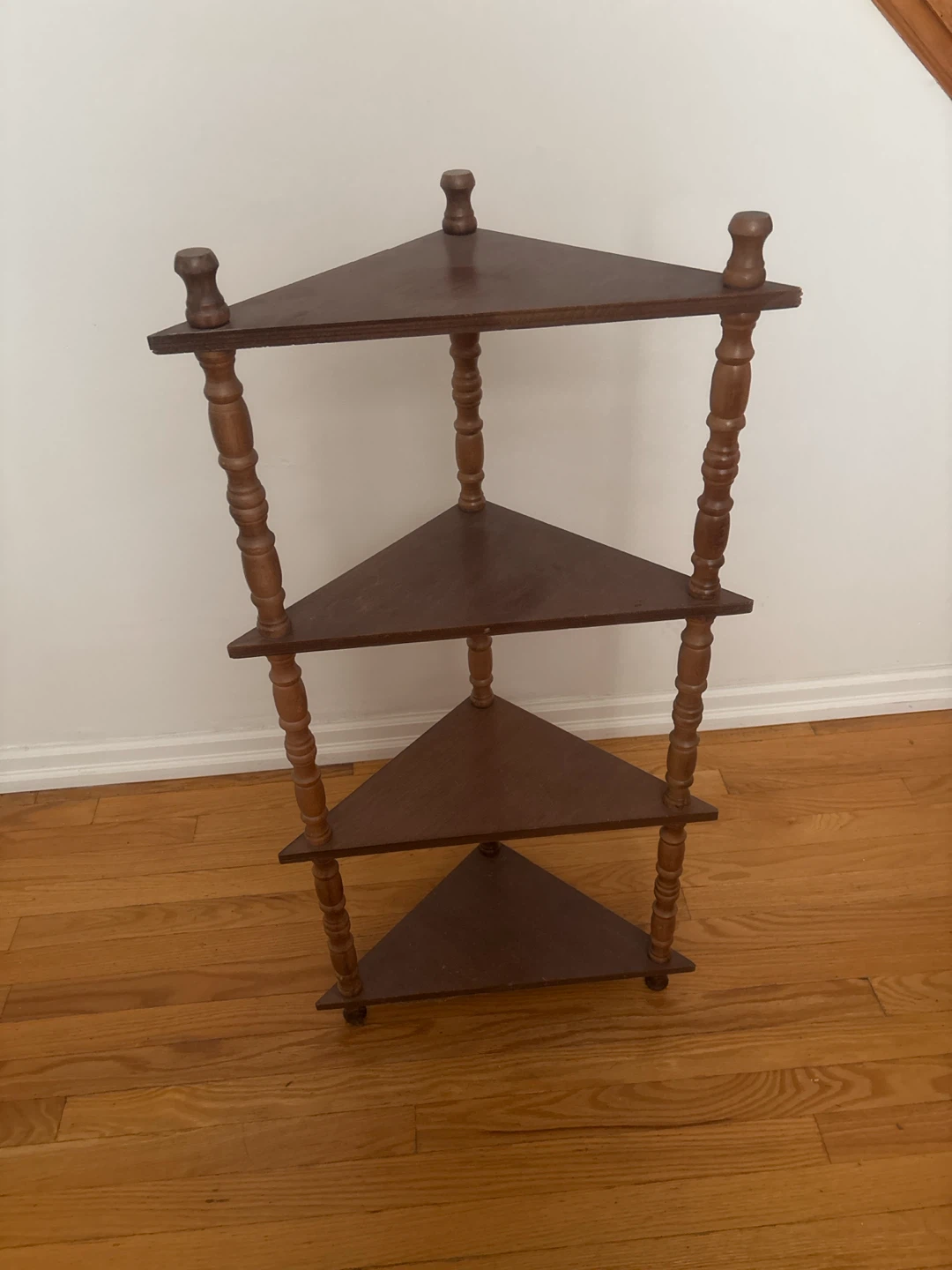 Vintage dark brown wooden corner shelf