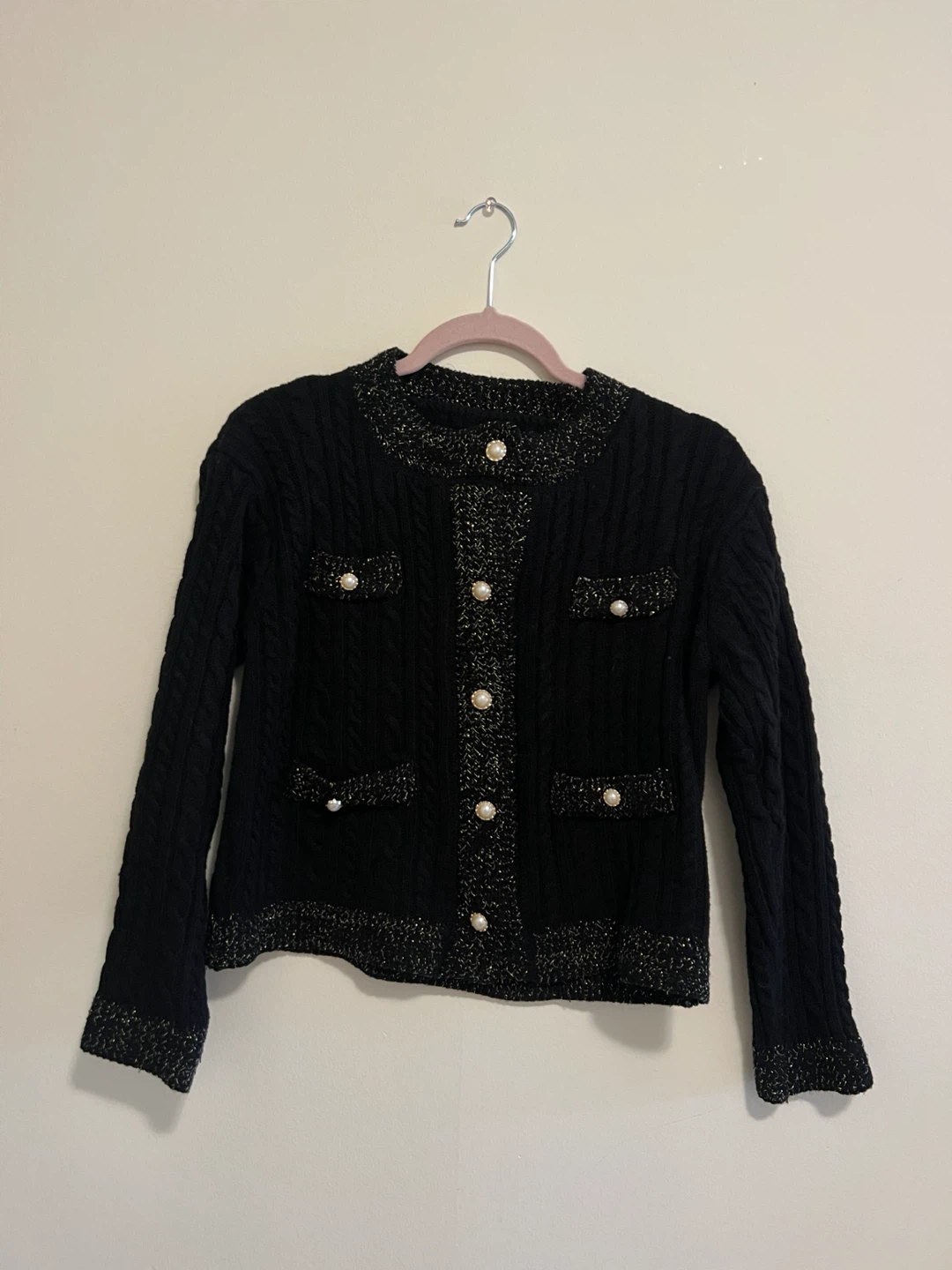 Black cable knit cardigan with pearl buttons