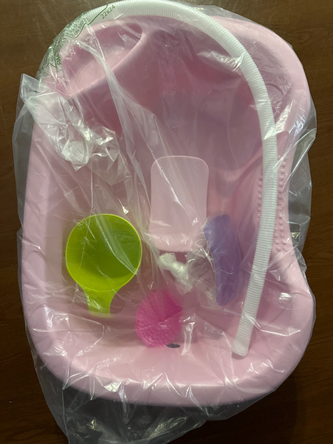 Pink portable hair washing basin and accessories