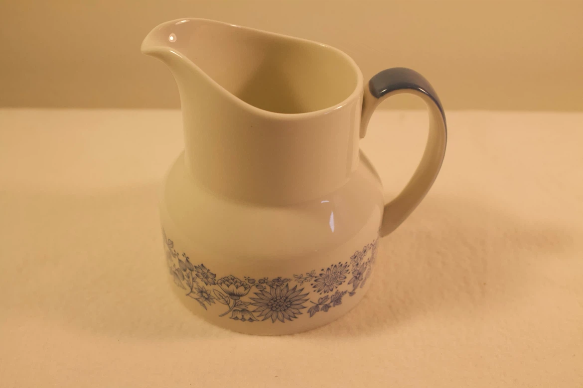 Royal Doulton Blue and White Pitcher with floral details