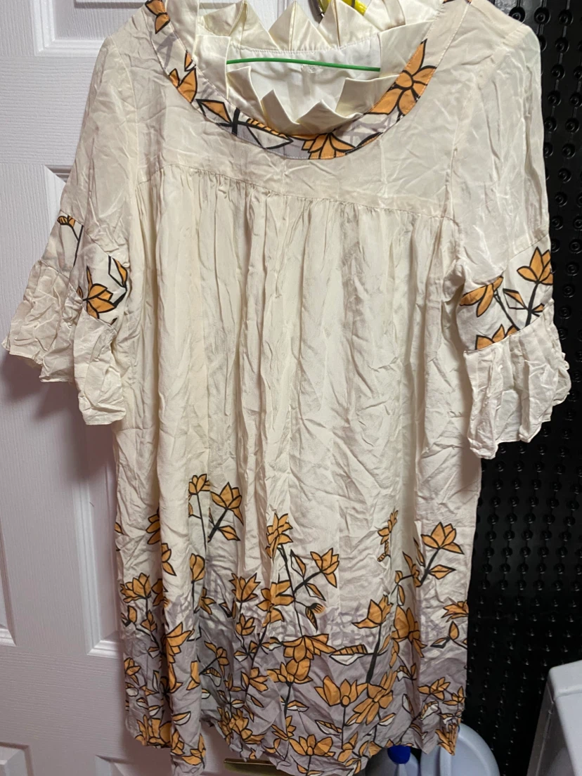 Cream silk dress with orange floral print