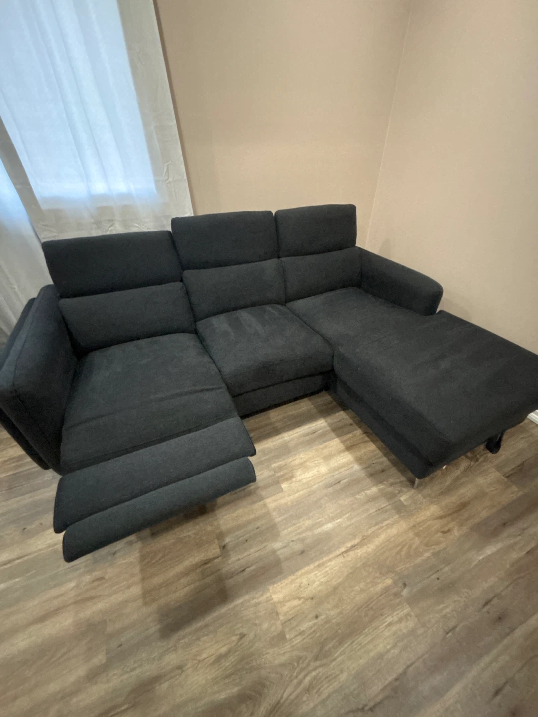 Dark blue sectional with storage