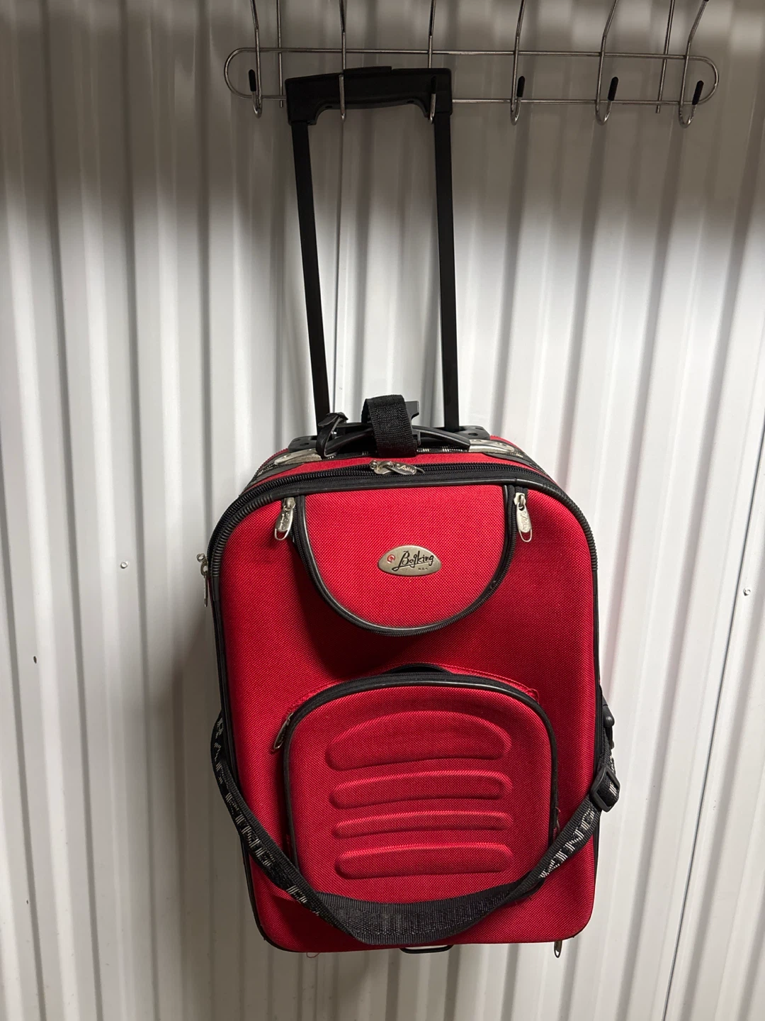 Red Rolling carryon Suitcase