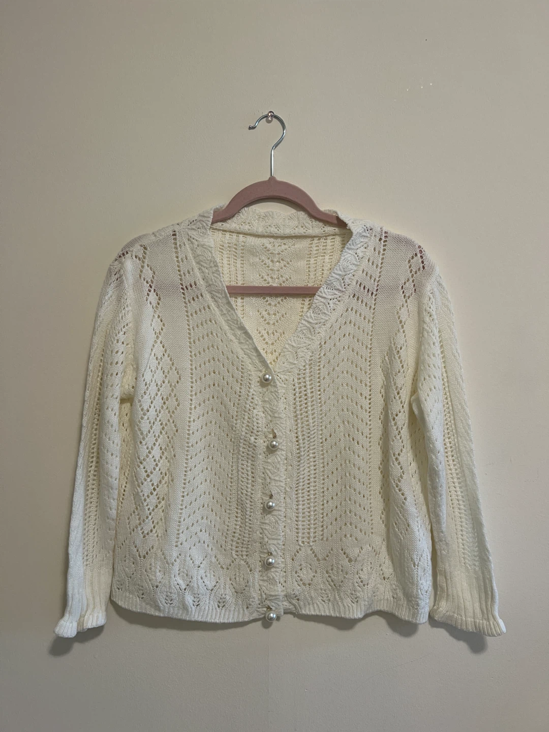 White pointelle knit cardigan with pearl buttons