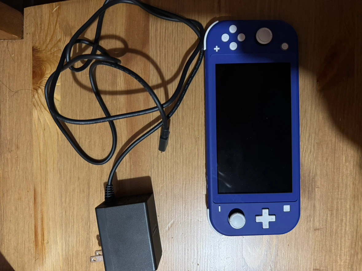 Nintendo Switch Lite Blue with Charger and 4 Games