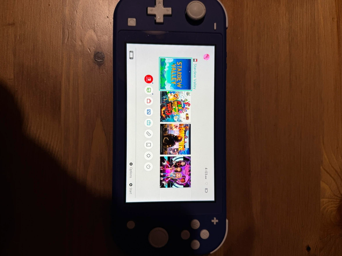 Nintendo Switch Lite Blue with Charger and 4 Games - photo 4