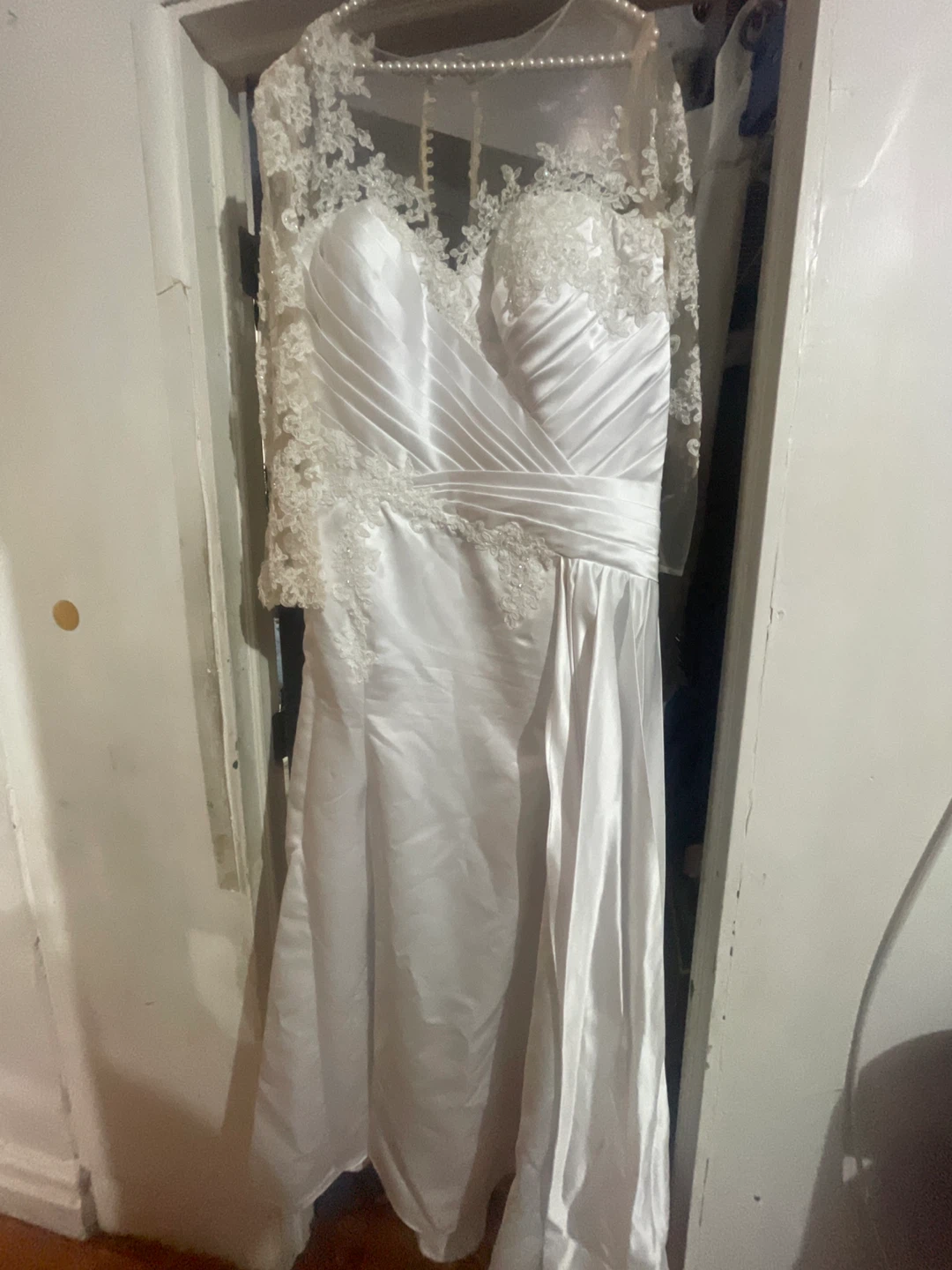 Long sleeve white satin wedding dress