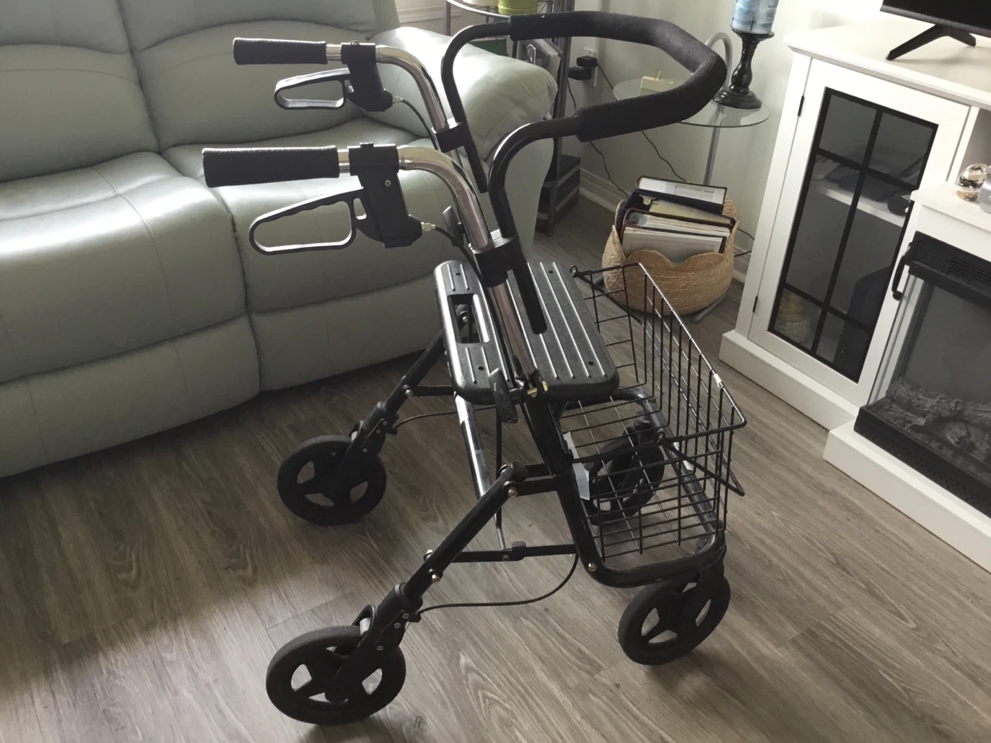 Black 4-Wheel Walker with Seat and Basket
