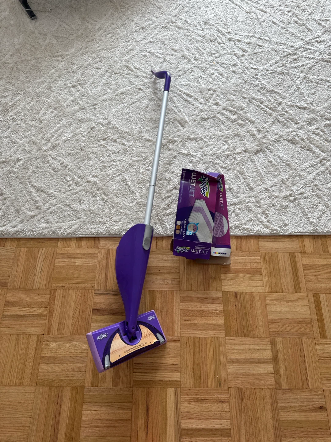 Swiffer WetJet floor mop with refill pads