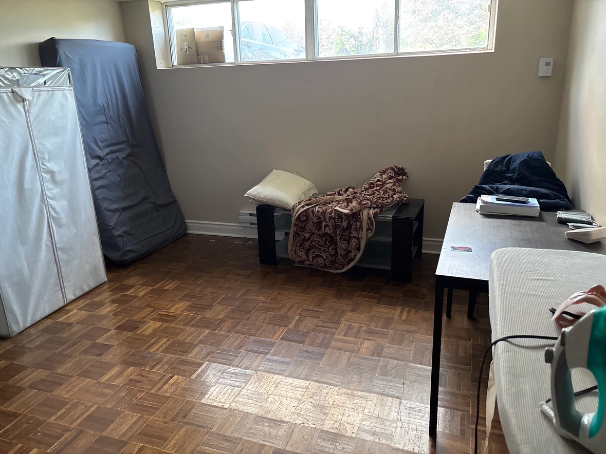 Basement room for rent . Sharing