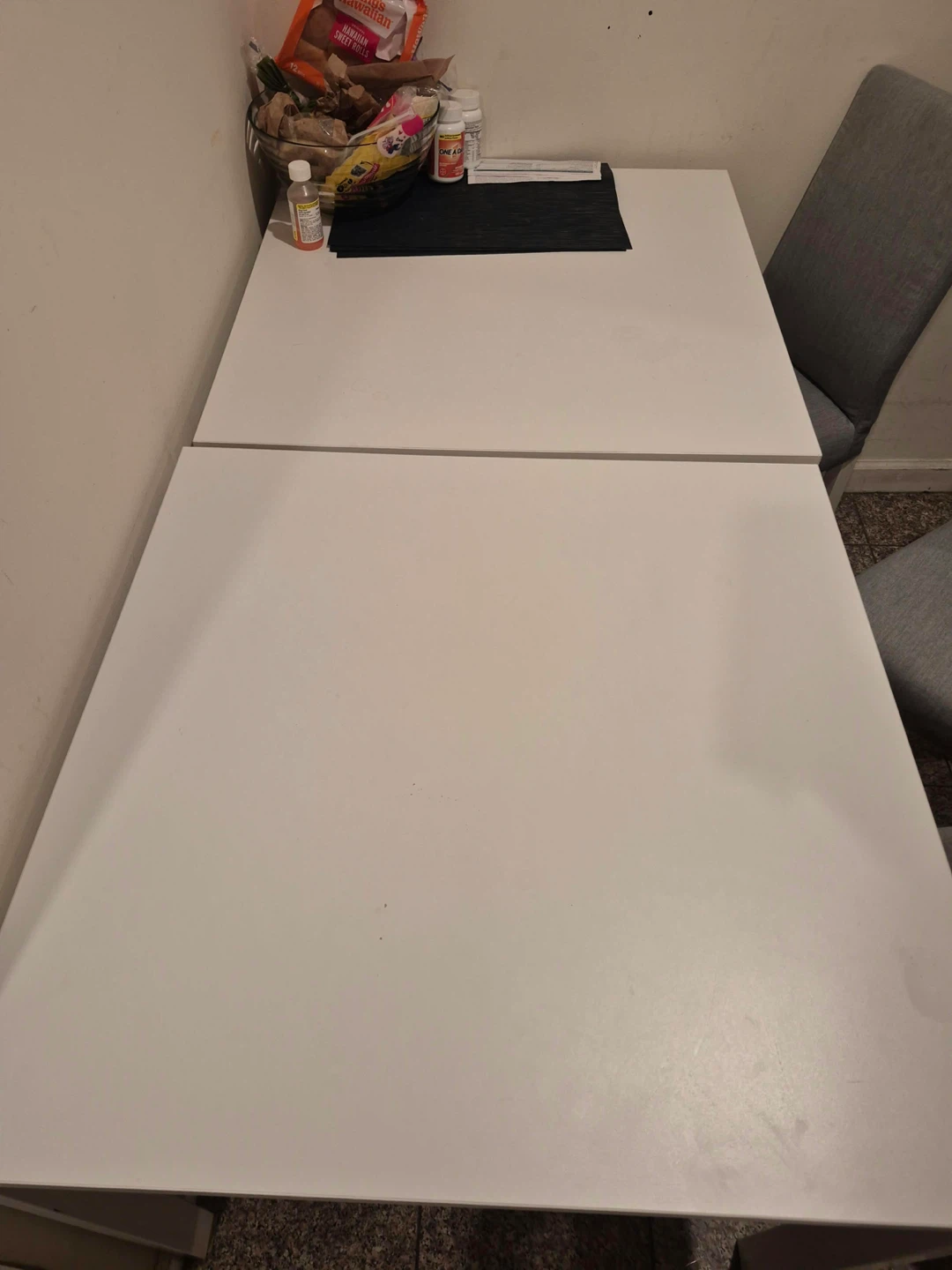 White Extendable Dining Table with 4 Gray Chairs