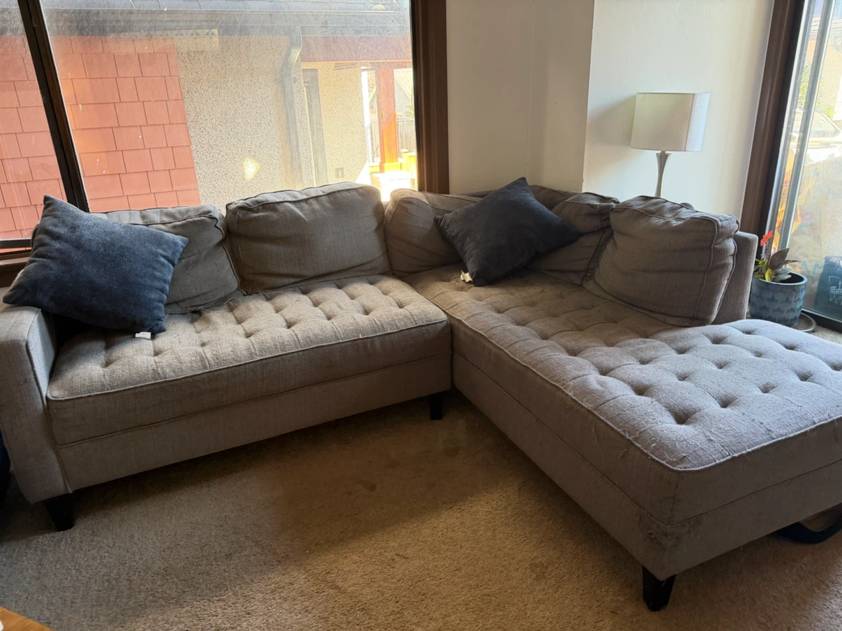 Grey tufted sectional sofa