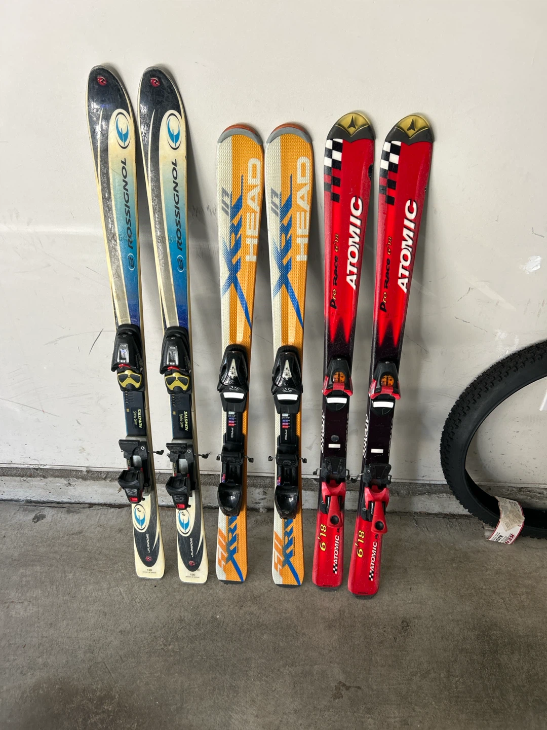 Rossignol Head and Atomic junior downhill skis