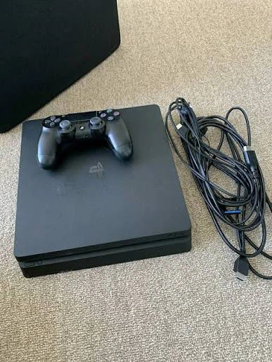 PlayStation 4 Console Slim with Controller and Cables