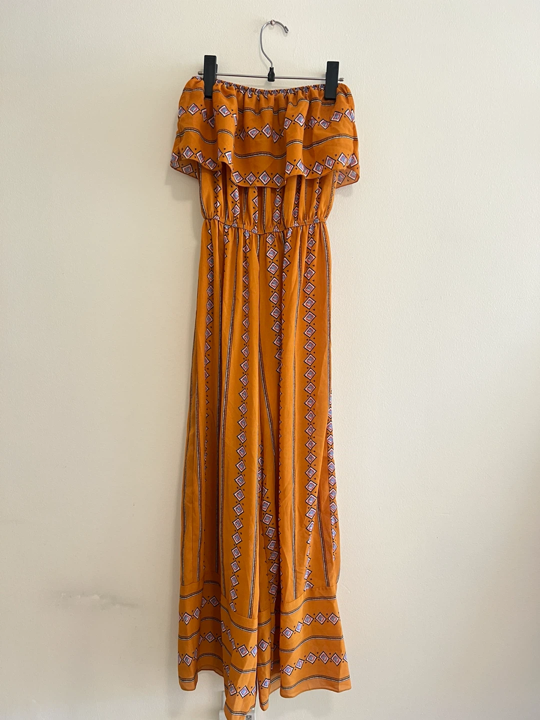 Orange patterned off the shoulder jumpsuit