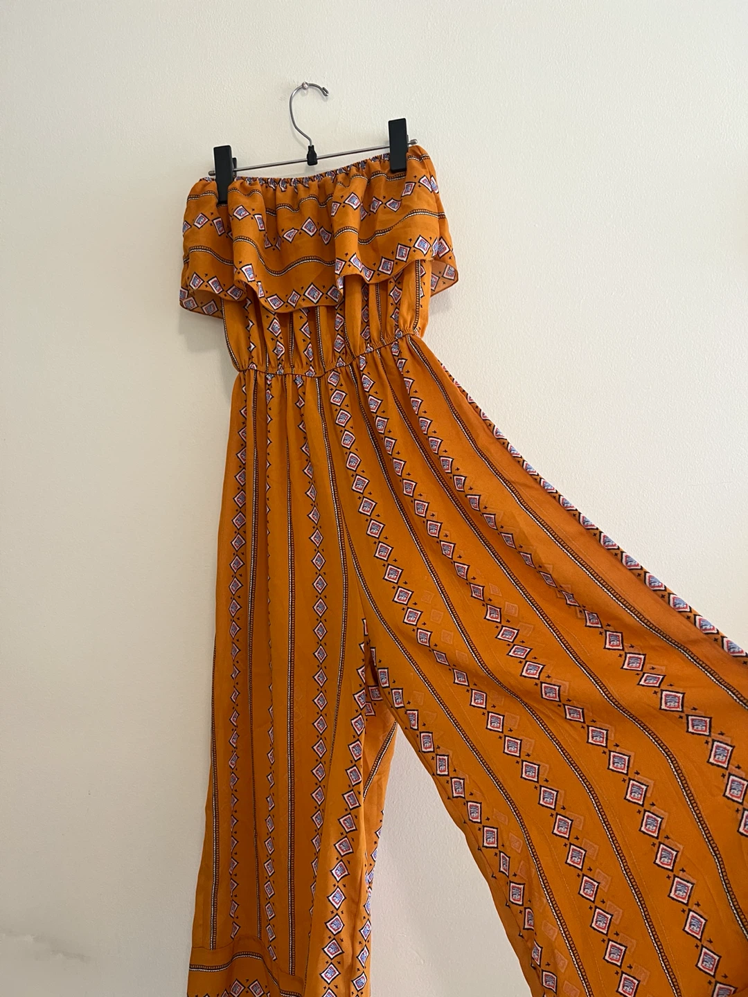 Orange patterned off the shoulder jumpsuit - photo 2