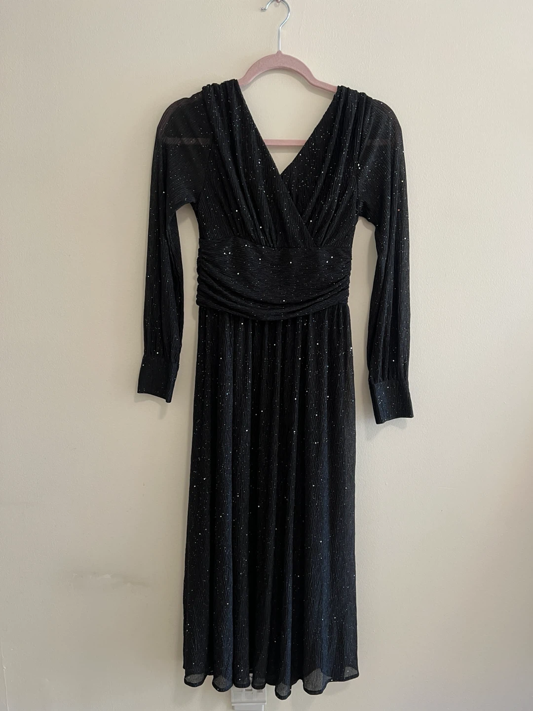 Long-sleeved black glittery maxi dress