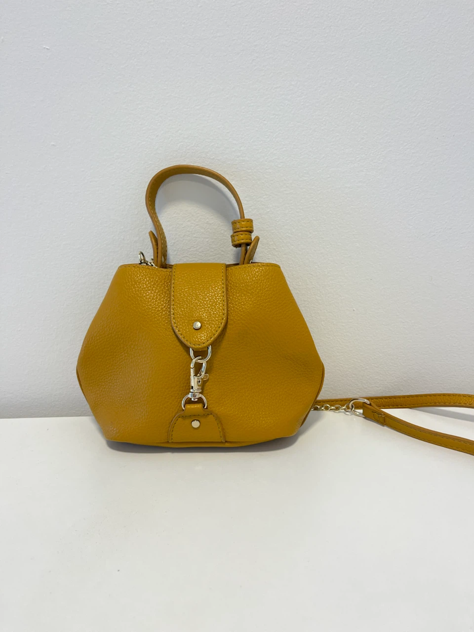 Yellow pebble leather mini bucket bag
