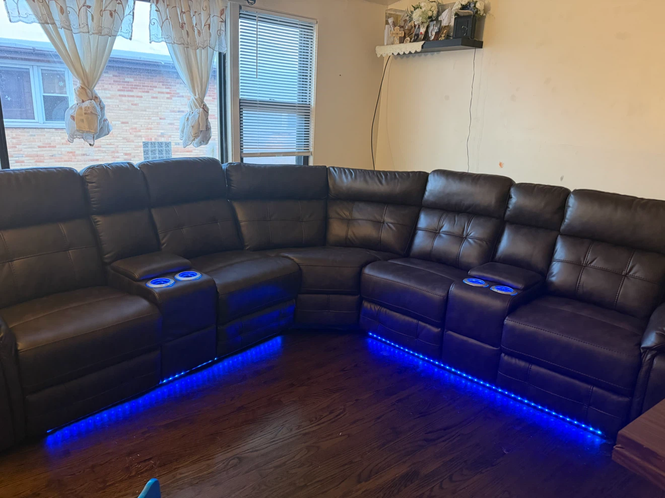 Black leather sectional sofa with LED lights