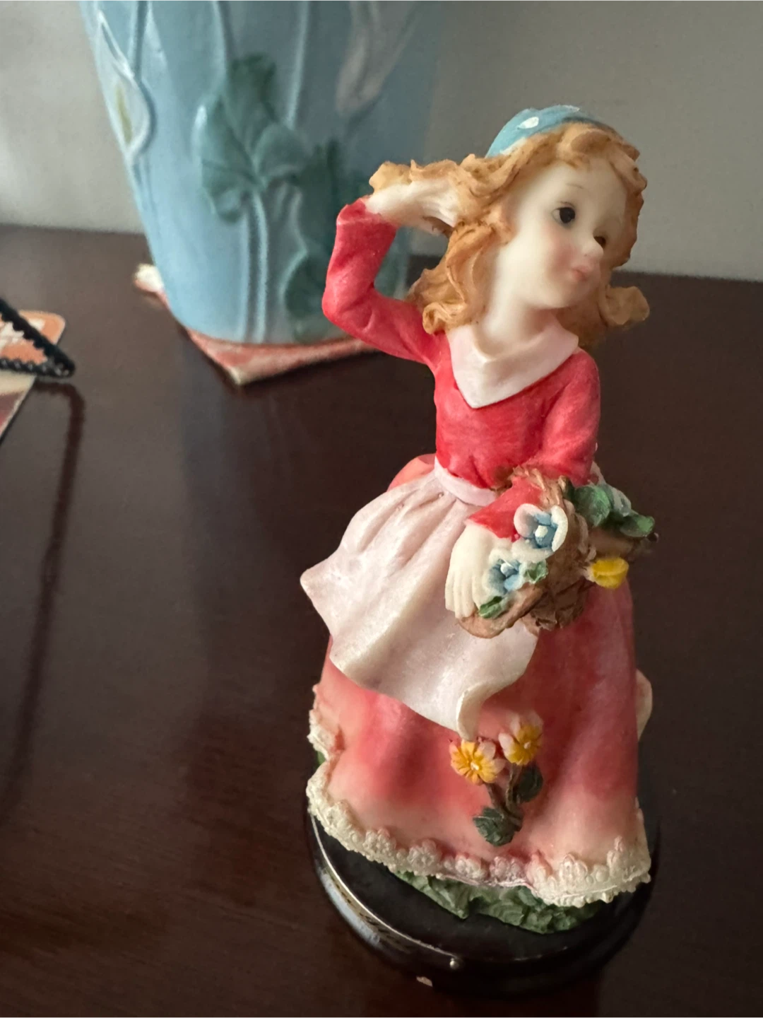Figurine of a Girl with Flowers