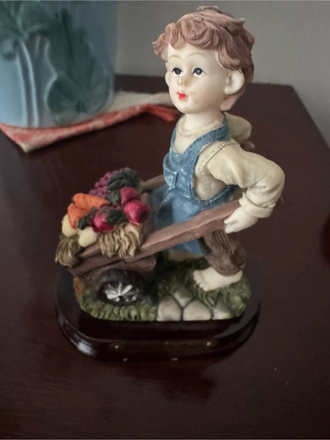 Figurine of a boy with a wheelbarrow of vegetables - photo 2