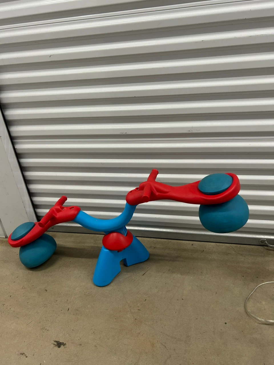 SpiroBouncer Red and Blue Teeter Totter