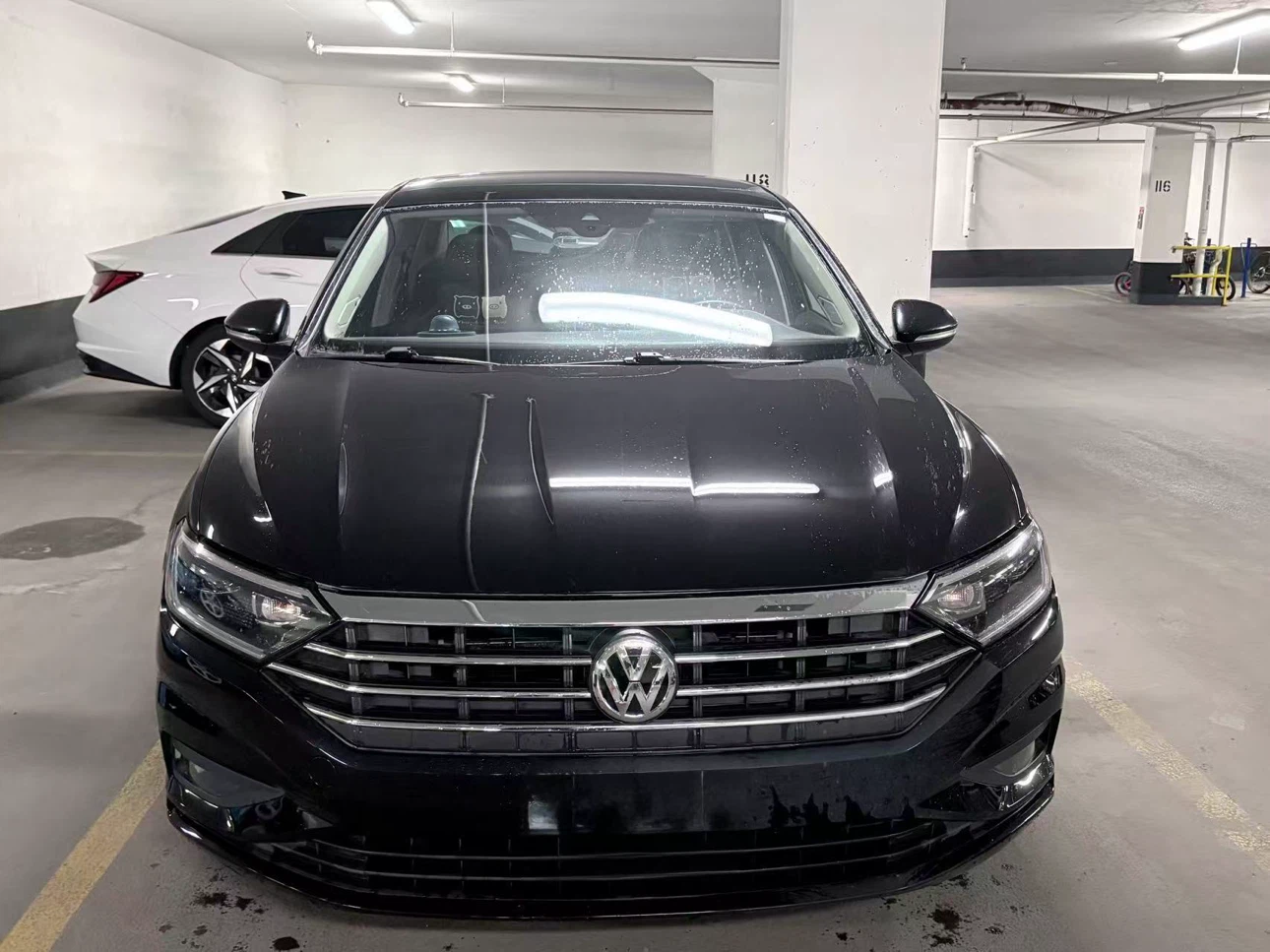 Black Volkswagen Jetta sedan