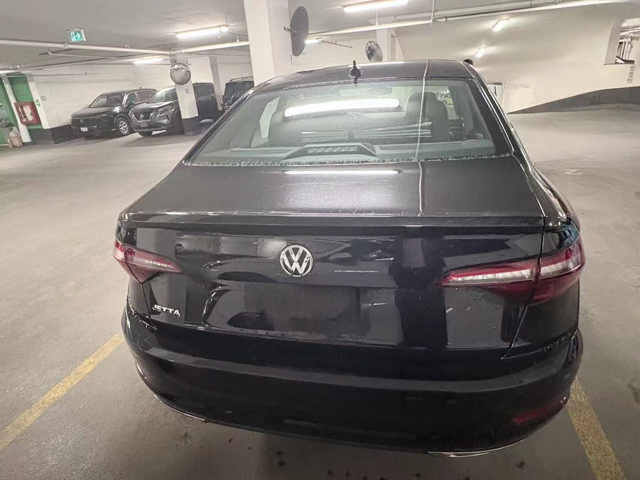 Black Volkswagen Jetta sedan - photo 5