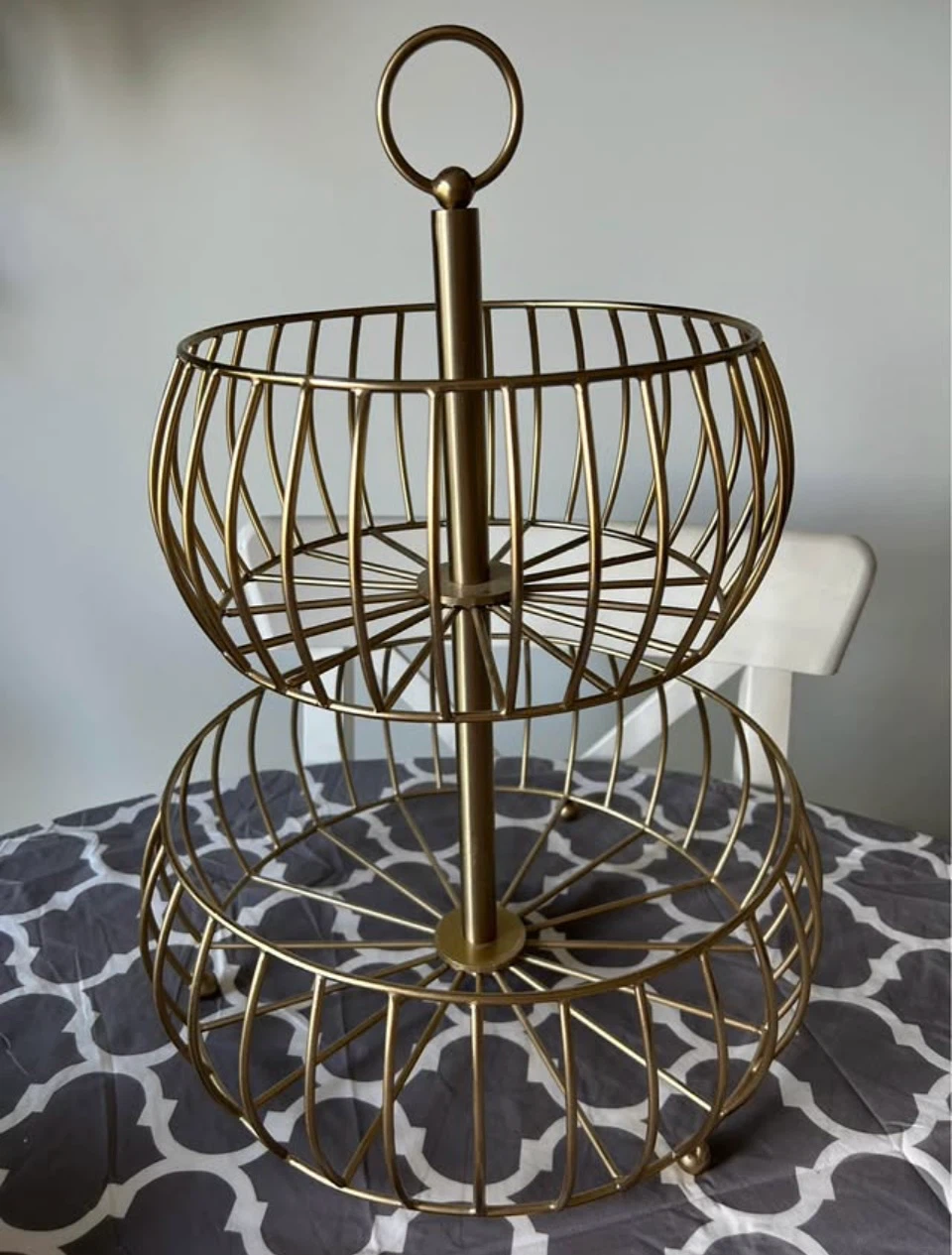 Two-tier gold wire fruit basket
