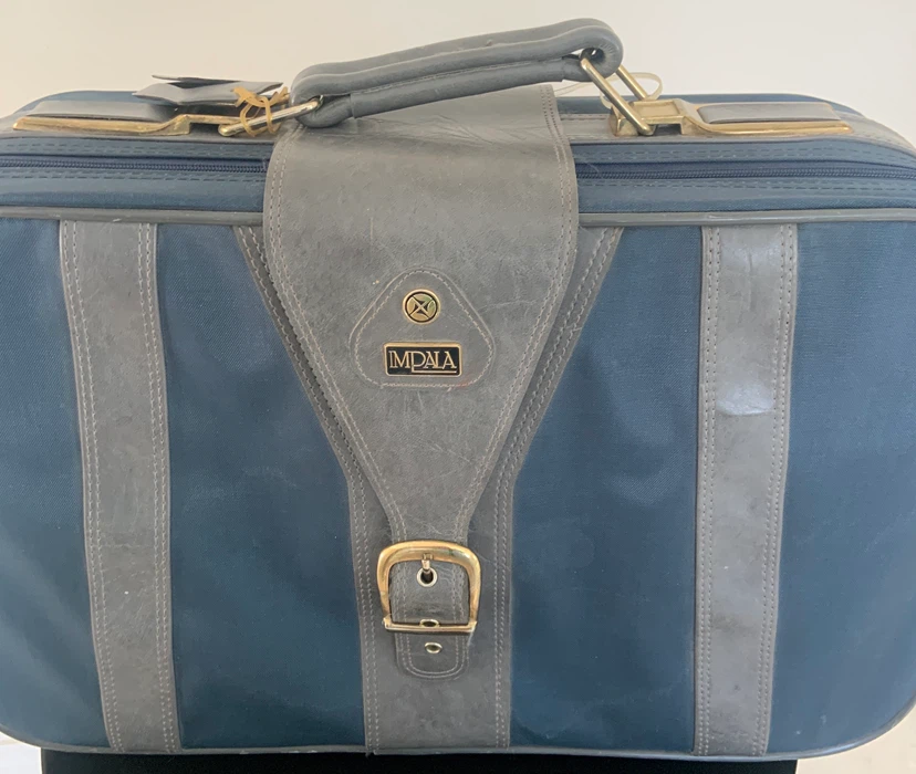 Impala vintage blue suitcase