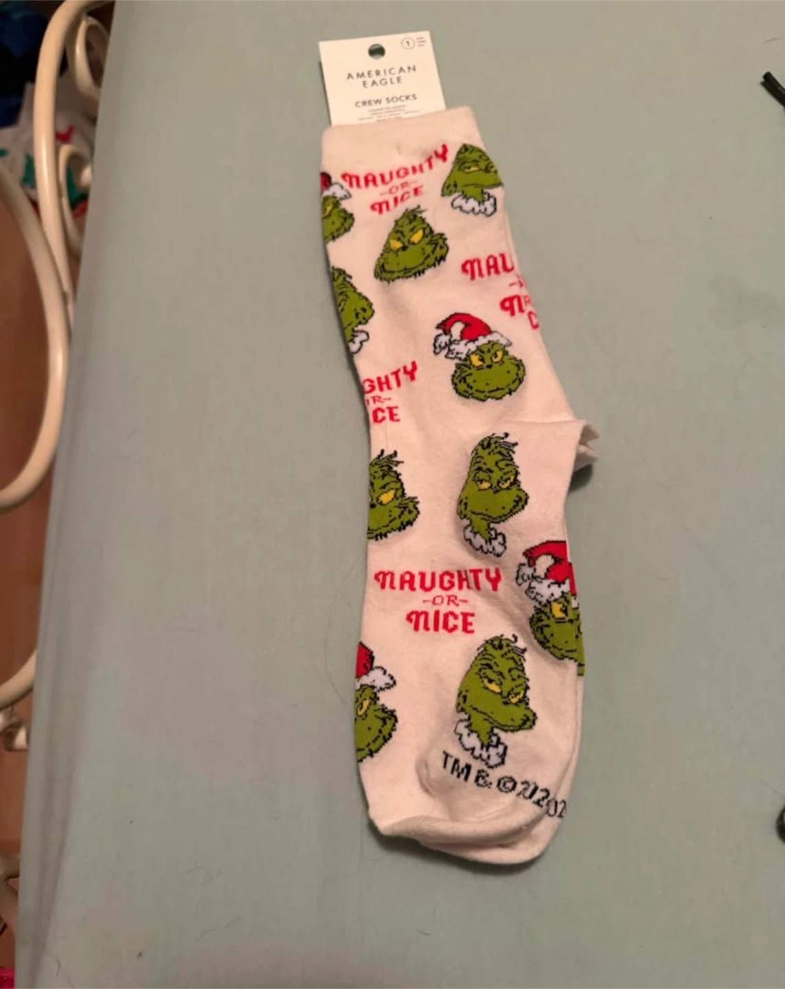 Women American eagle socks tags on grinch