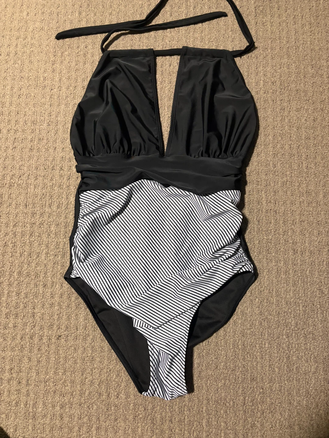 Black and white striped halter one-piece swimsuit