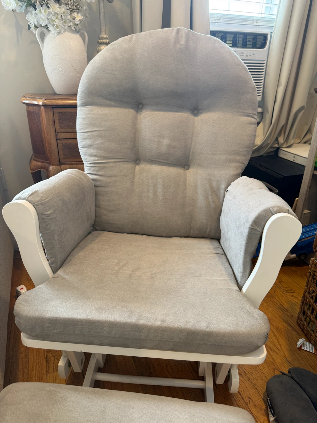 Gray glider chair with matching ottoman