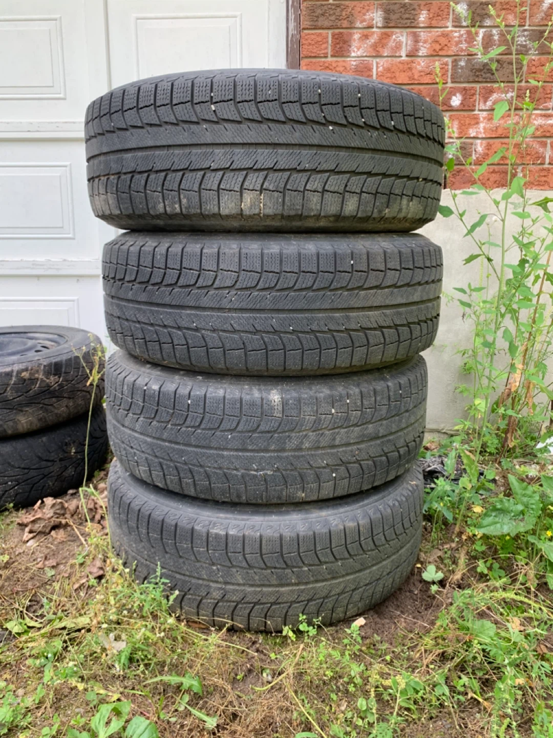 4 used snow tires with rims