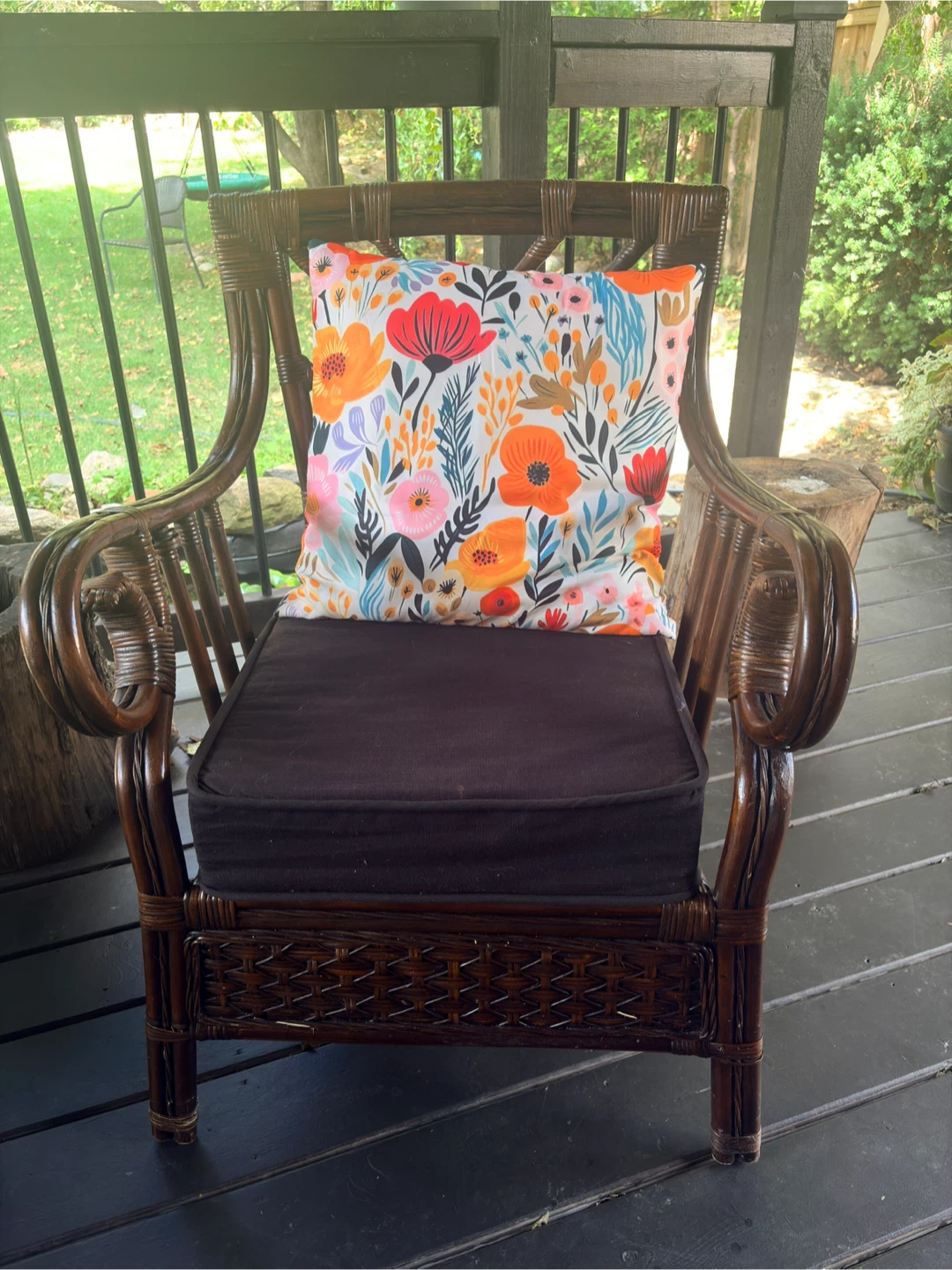 Wicker patio chair with floral cushion - photo 2