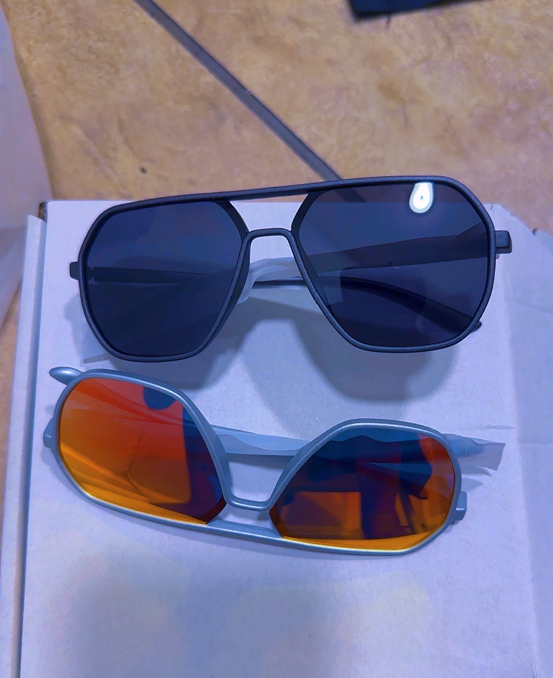 Oakley Sunglasses with Black and Orange Lenses